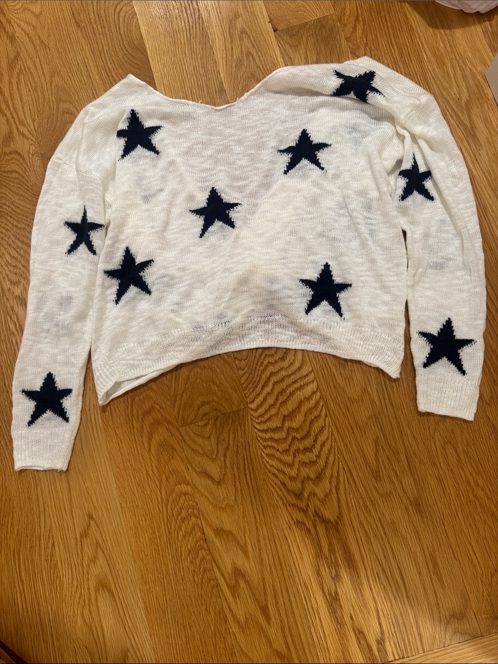 Francesca's Collections White Sweater with Black Star Accents. Runs small
